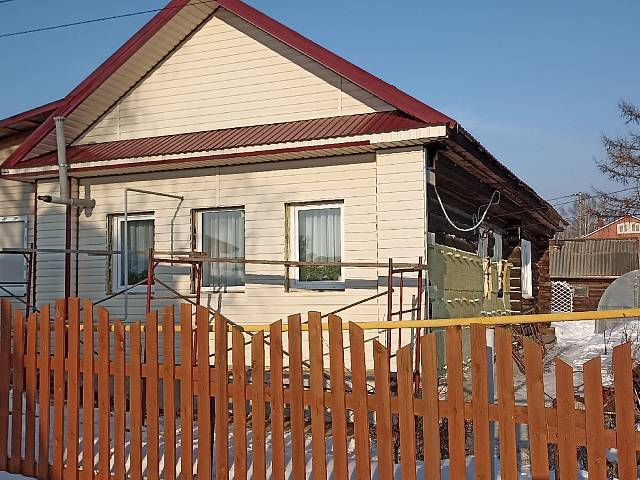 Отделка деревянного дома сайдингом с утеплением в деревне Абушково